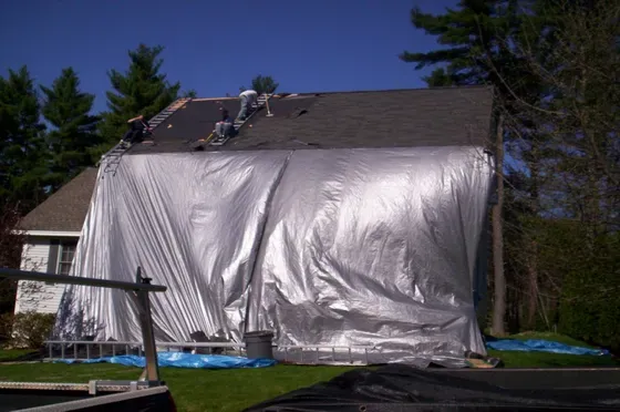 Silver Tarp on Roof - Merrimack, NH