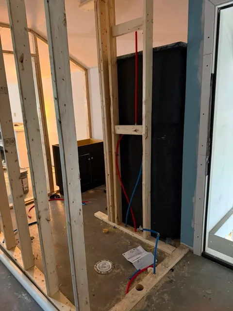 Bathroom remodel framing with new plumbing rough-in