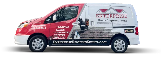 A red and white van with the word enterprise home improvement on the side
