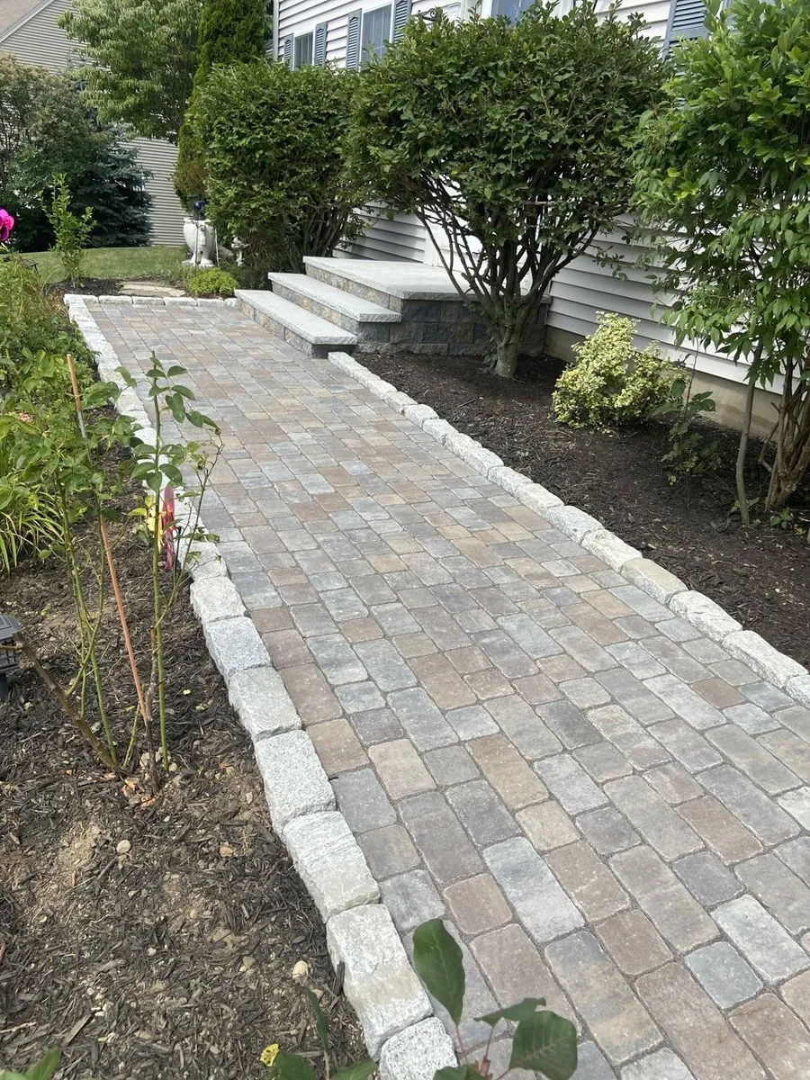 Paver walkway with professional edging in Central Massachusetts