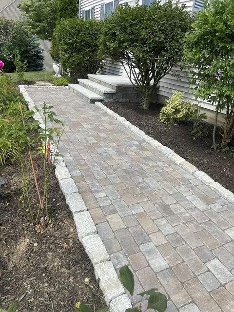 Paver walkway with professional edging in Central Massachusetts