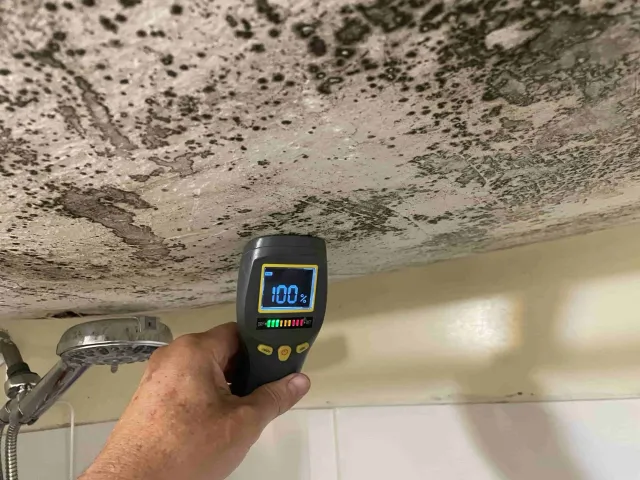 Shower ceiling about to fall into the tub!