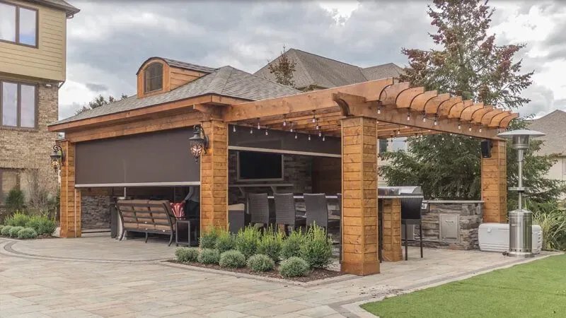 SunPro Motorized Retractable Screens on patio set in backyard entertainment space