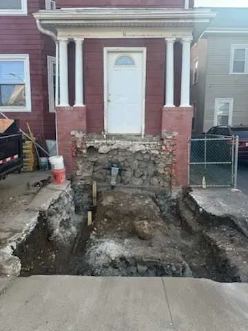 Our professional masonry team specializes in transforming basements into functional living spaces through our top-notch home renovations service. Elevate your home with a custom basement renovation today! for Build Smart Masonry and Roofing in Boston, MA
