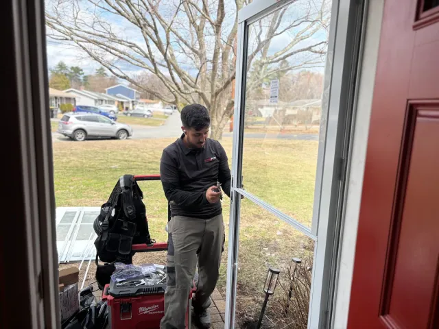 Storm Door Pro installer fitting a new storm door