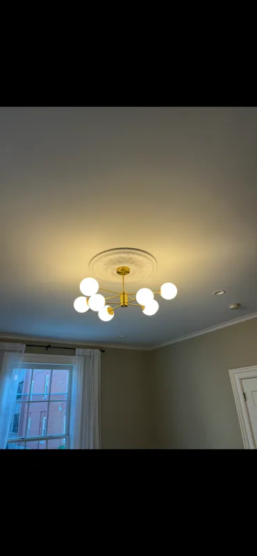 Modern chandelier installation