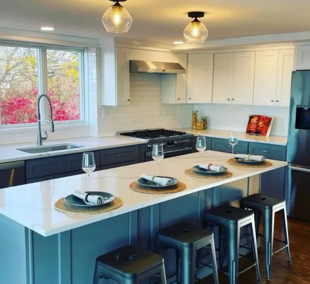 Teal shaker kitchen installed by Quality Design Cabinet
