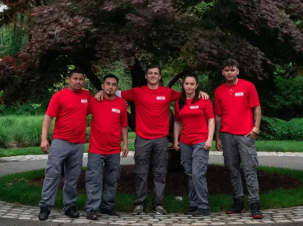 A team of professional Smooth Move & Delivery movers posing outdoors, representing our expert crew for Norwalk, CT.
