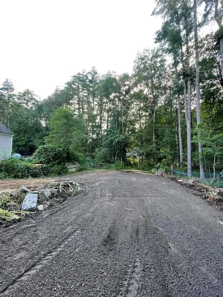 Our Roadbeds service ensures a stable foundation for driveways and pathways by expertly leveling terrain, improving drainage, and laying the groundwork for long-lasting, durable surfaces that enhance your property's accessibility. for Witt Excavating in Hudson, NH