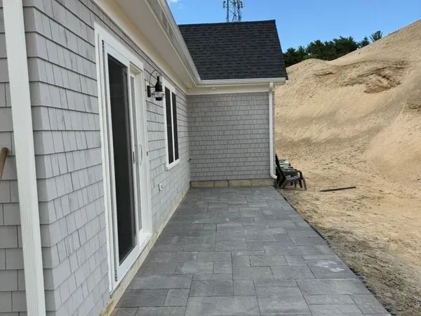 Beautiful paver patio installation by MAC Excavation & Landscape in South Shore MA