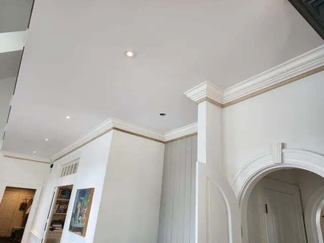 Crown molding with arched doorway