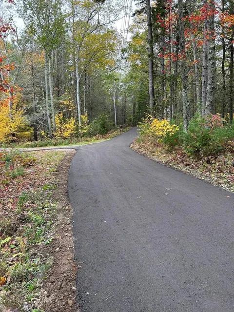 Reclaimed and freshly paved road