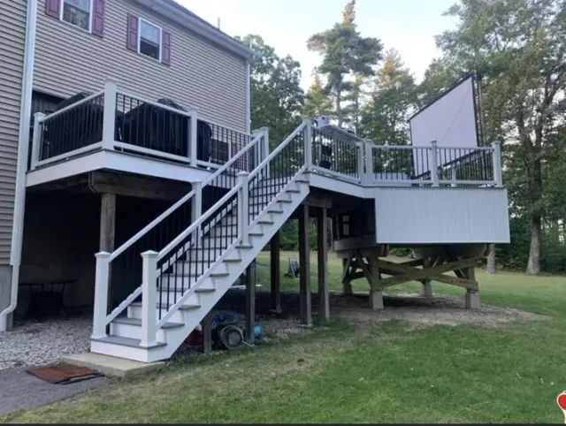 Elevated composite deck with white and black railings