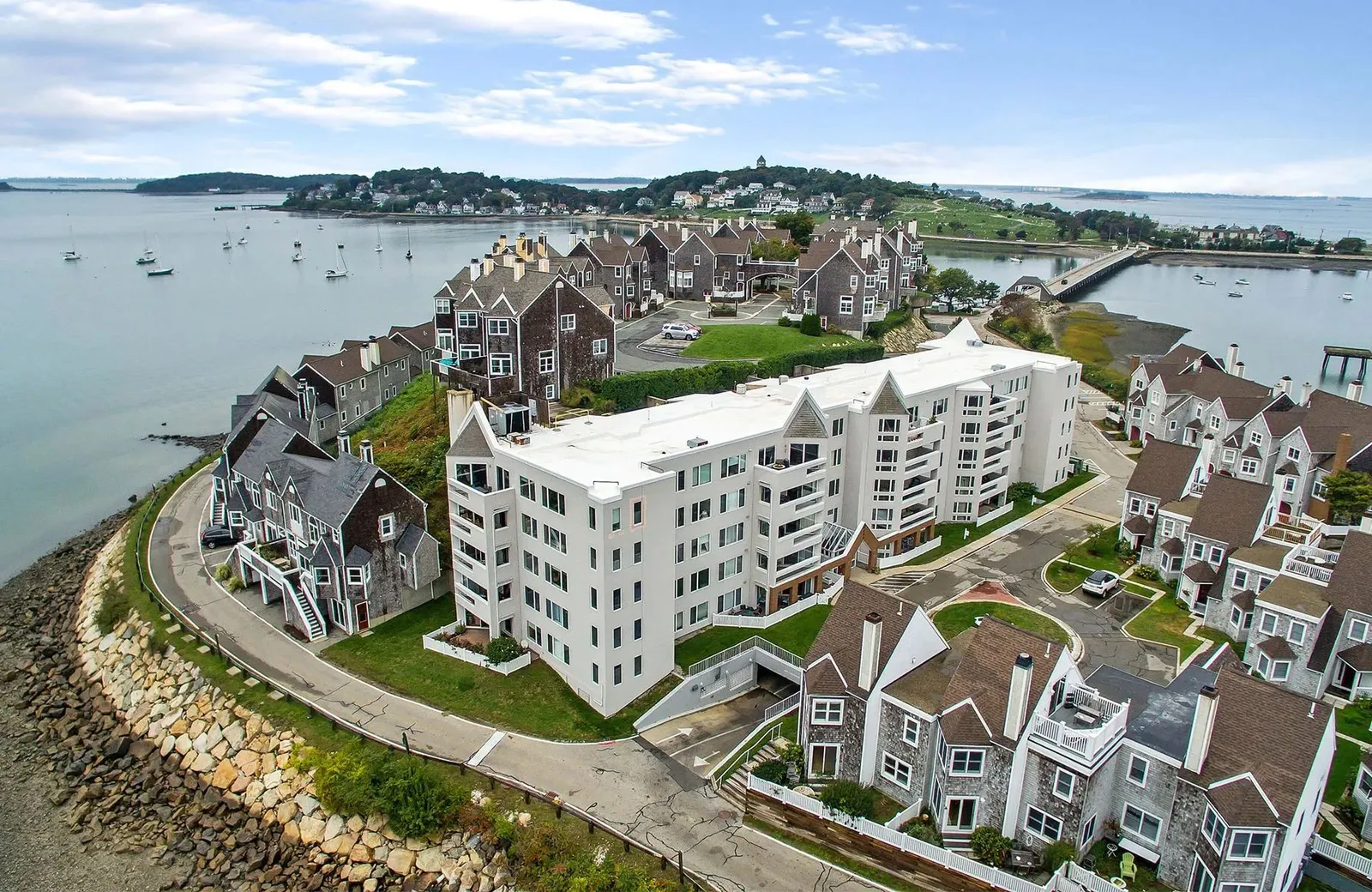 Aerial view of a completed waterfront condominium roofing project