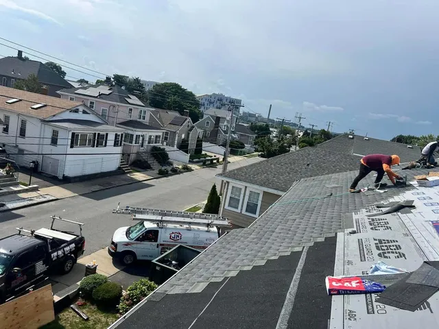Roof replacement underway on a neighborhood home