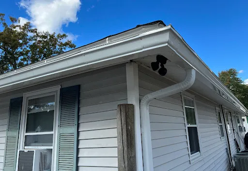 Hands on Gutters work photo