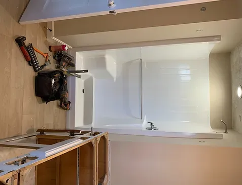 before after all marble shower walkin nh best looking bathroom marble tile shiplap ceiling floor walls storage space niche black tan white grey drain shower fixtures plumbing rainfall design bpr llc contractor tiler installer repair