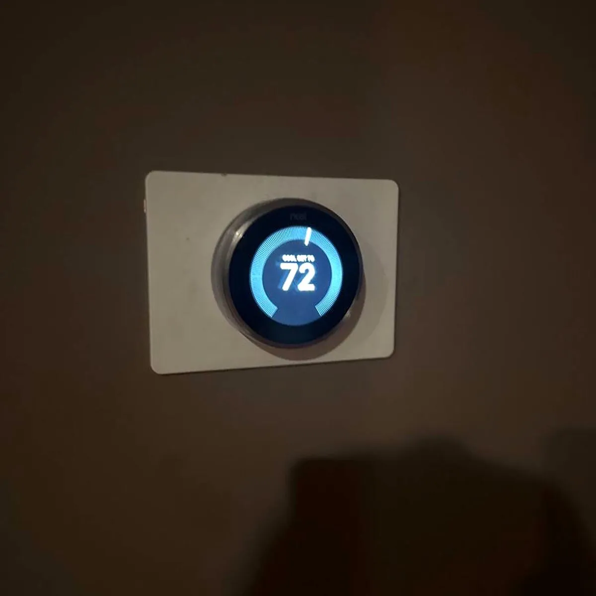 Newly installed smart thermostat on the wall