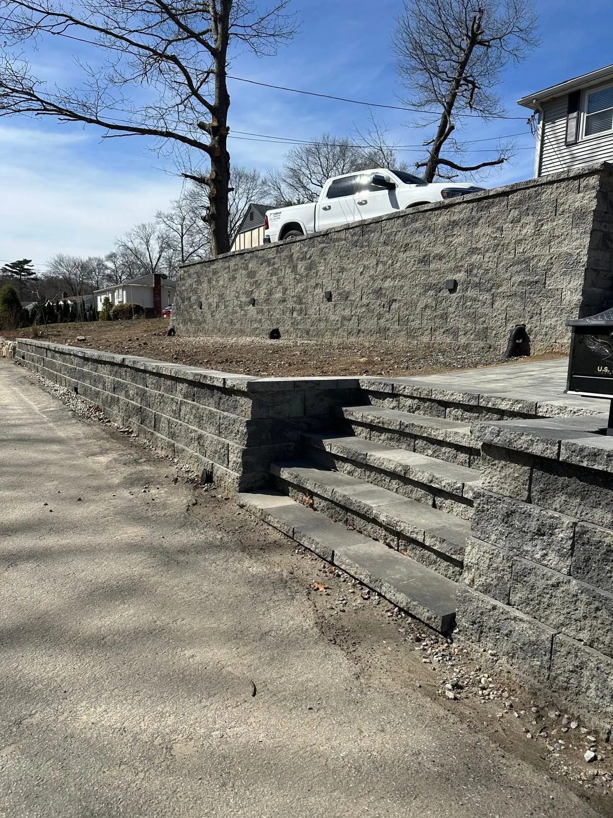 Granite block retaining wall with steps built in Boston, MA