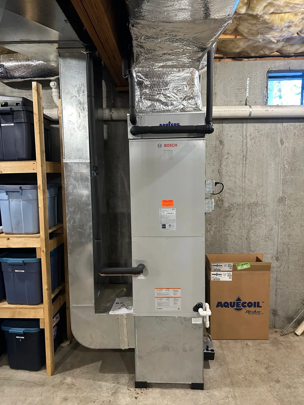 Bosch air handler and AquaCoil hydronic coil installed by Service Solutions in Central Massachusetts