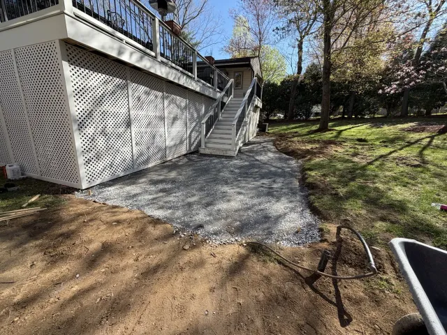 Compacted processed-gravel base during the Bellingham Massachusetts patio project