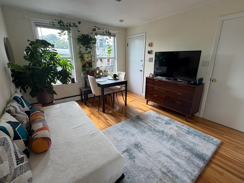 Great location!! Can walk to Harvard, Inman & Central squares and Kendall sq. home of MIT is a bus stop away using MBTA bus 68.It is across from Beautiful Joan Lorentz Park and the Cambridge Public Library. It is a corner top floor unit that has lots of windows and gets great light.Bathroom and kitchen have been updated. Hd floors throughout. Lndry and a private storage room in basement. Store bikes. Heat and hot water are included in condo fee. Great investment condo or first time buyer condo. O.H. Saturday 8/15/26 11:00-12:30 P.M.