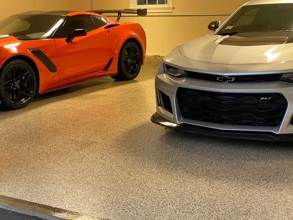 An image showing a freshly cleaned and installed flake garage epoxy floor.