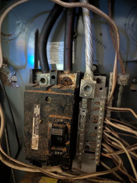 Corroded main breaker found during inspection
