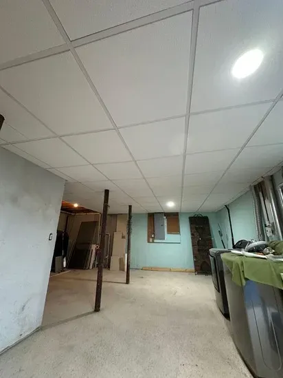 Completed drop ceiling Spencer MA demonstrating flush recessed lighting integration.