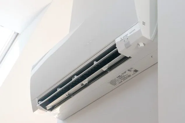 Ductless mini split wall unit for efficient heating and cooling in Cape Cod homes.