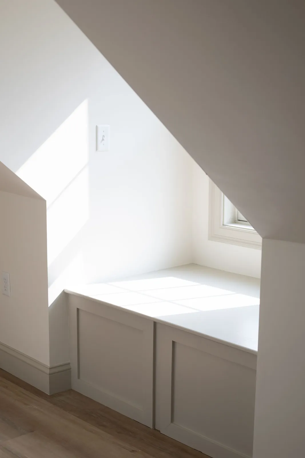 Attic conversion with built-in window seat