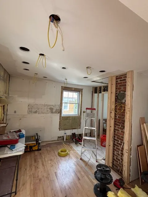 New recessed-lighting wiring installed during a kitchen remodel in Portland, Maine