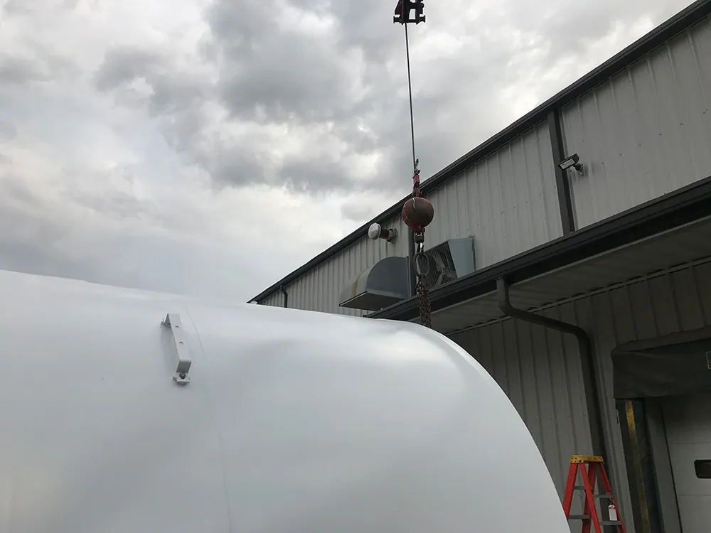 Worked with another crane operator, using two cranes to install a 40 ft storage tank at an industrial business