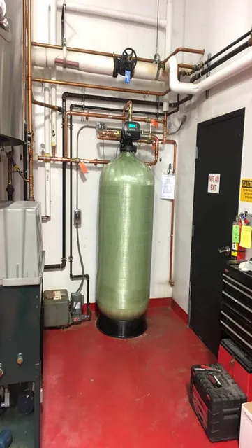 Large tank of activated carbon to remove bad taste & odor from the feed water supplying this local craft brewery.