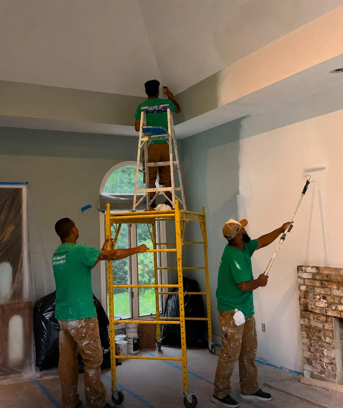 Seven Pines painting crew working inside a home in Shrewsbury, Massachusetts