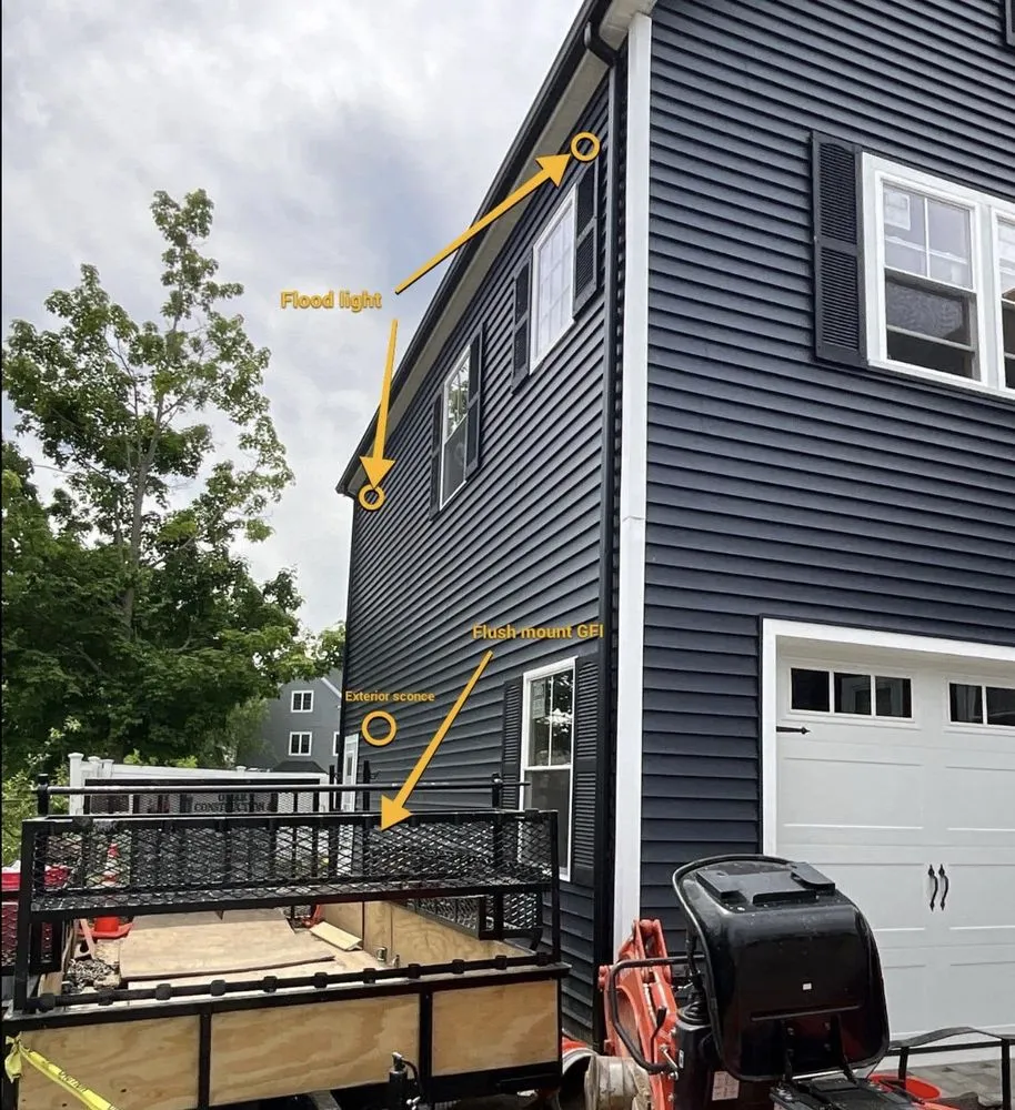 Annotated exterior plan: flood light, sconce and flush-mount GFI locations