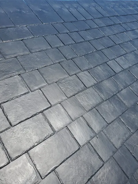 work photo from newroofingandsiding.com