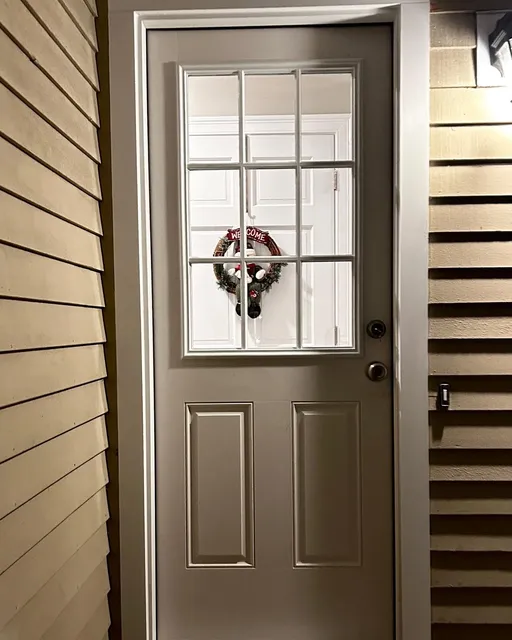 Replacement exterior entry door with divided-lite glass