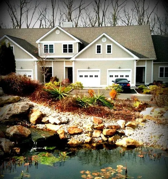 Winding Brook Condominiums, Southbury CT: townhouse unit exterior with stone water feature