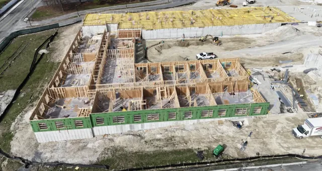 Aerial view of commercial foundation and wood framing construction