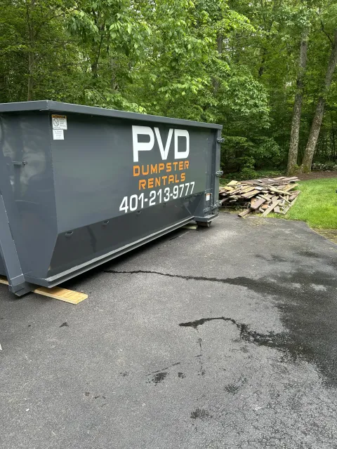 20 yard dumpster loaded with demolition debris on a demolition job in Rhode Island