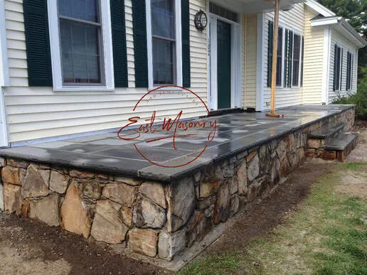 Raised terrace bluestone patio