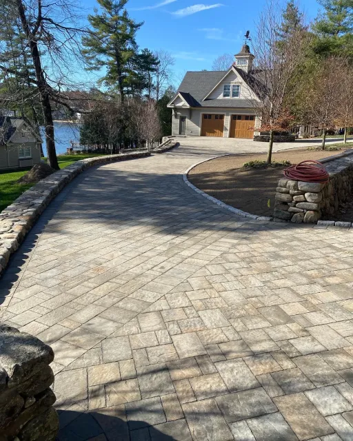 Lakeside paver driveway built by Tamarack Landscaping