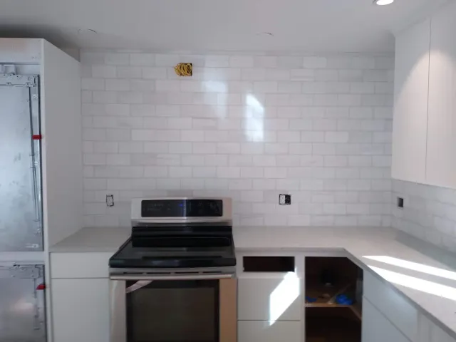 White Marble Subway Tile in Greenwich CT — Classic 3x6 white marble subway tile backsplash with clean grout lines
