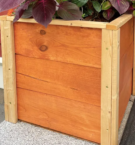 custom self-watering planter wood planks
