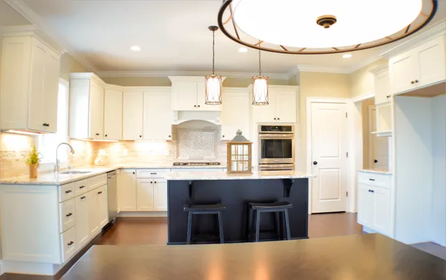 Finished kitchen with navy island