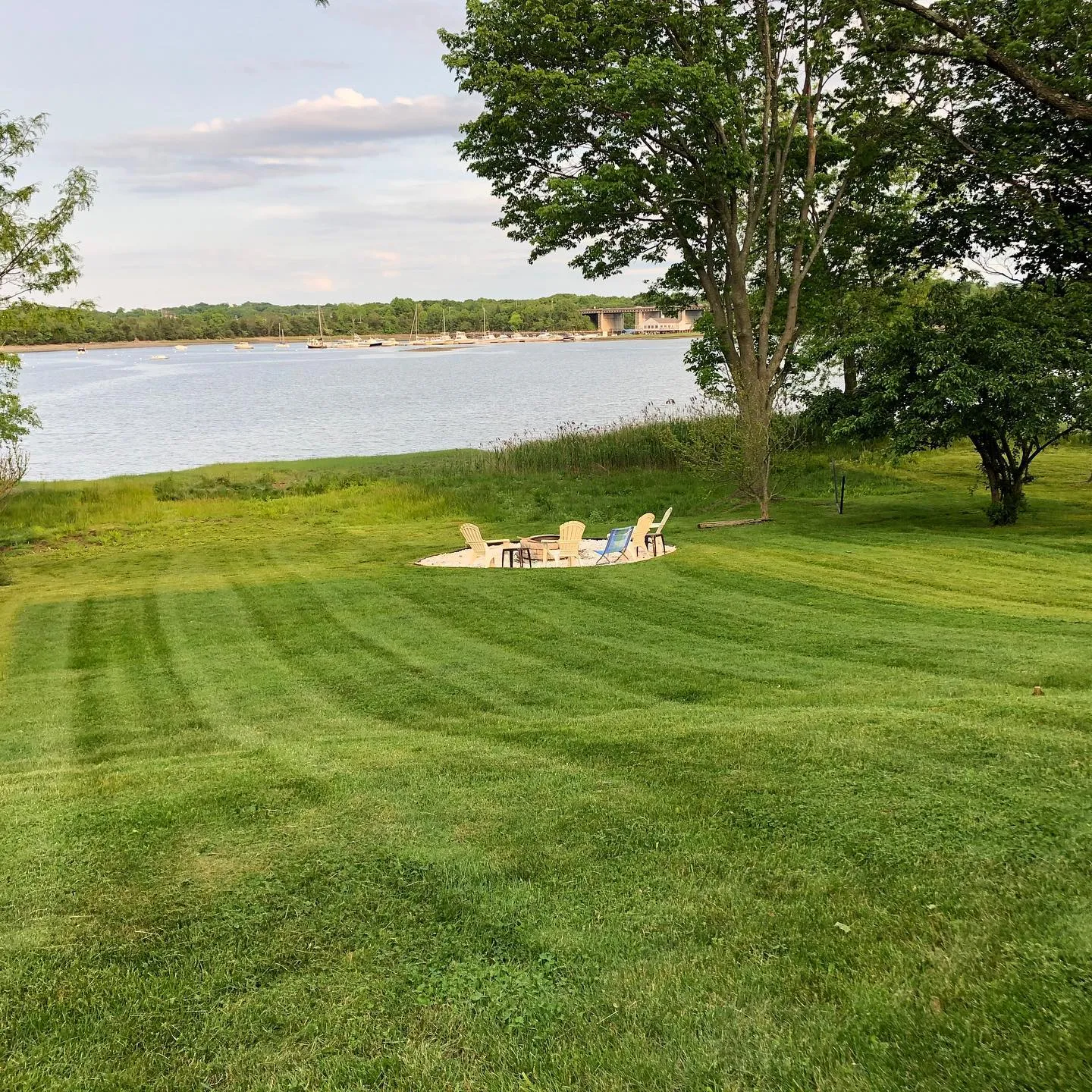 Waterfront lawn mown in stripes