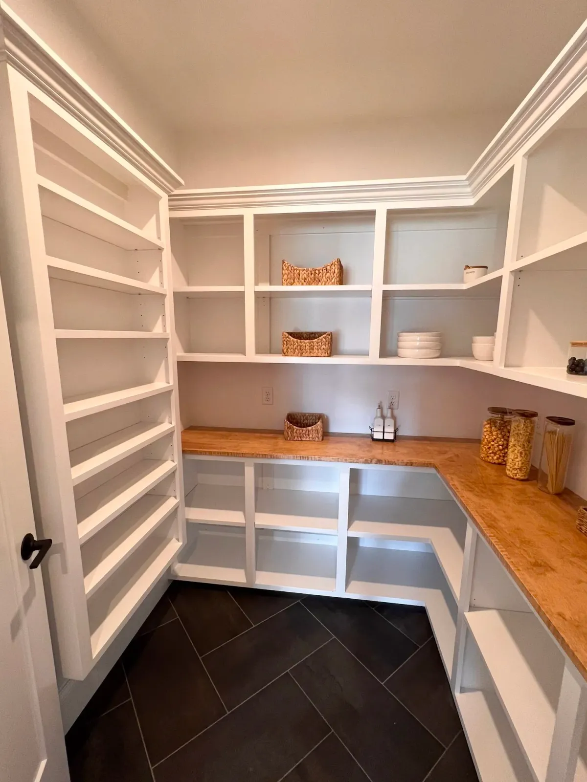 Custom pantry shelving and cabinetry.