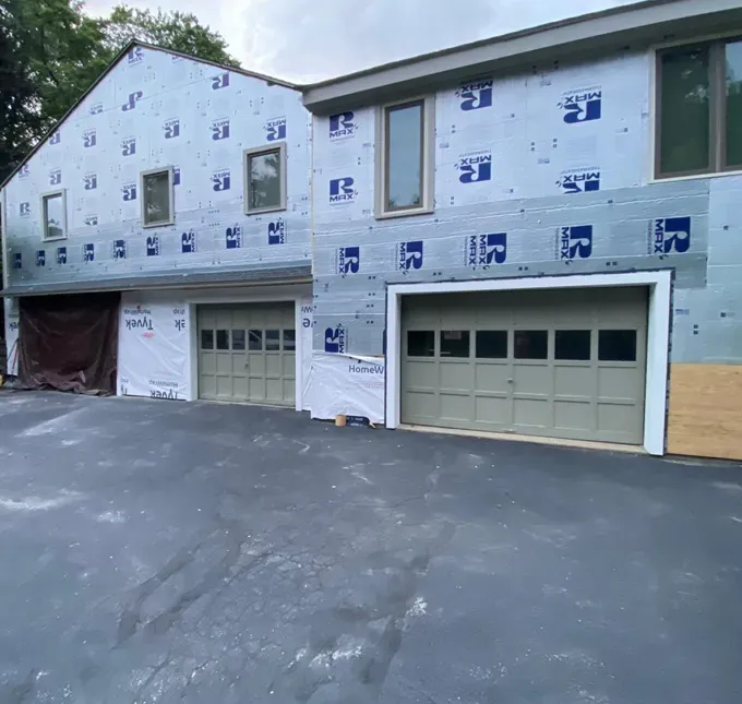 Weston Massachusetts home during siding replacement with R-Max insulation