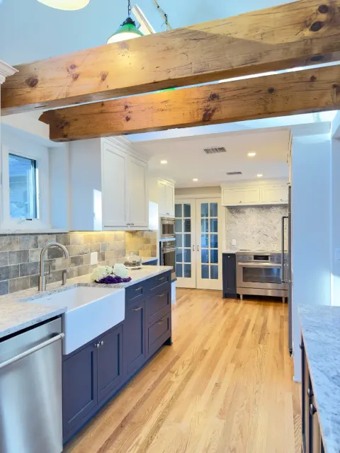Bright, modern kitchen with wooden beams